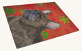 Hand-illustrated French Bulldog Holiday Snowflakes Glass Cutting Board
